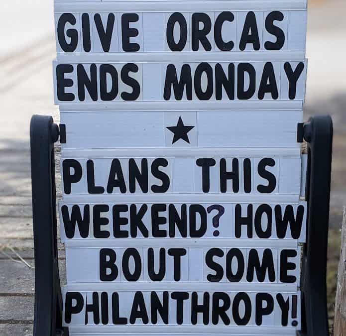 GiveOrcas Signage at OICF